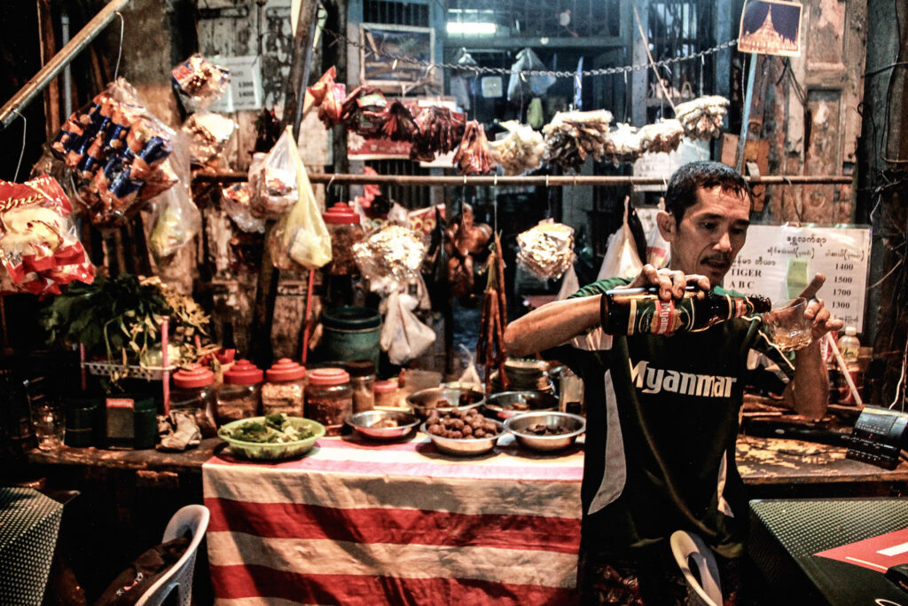 Customers can buy some high-quality liquor bottles or they can even drink a small cup of cheap liquor that costs around 100 Kyat (10 cents, in 2013).