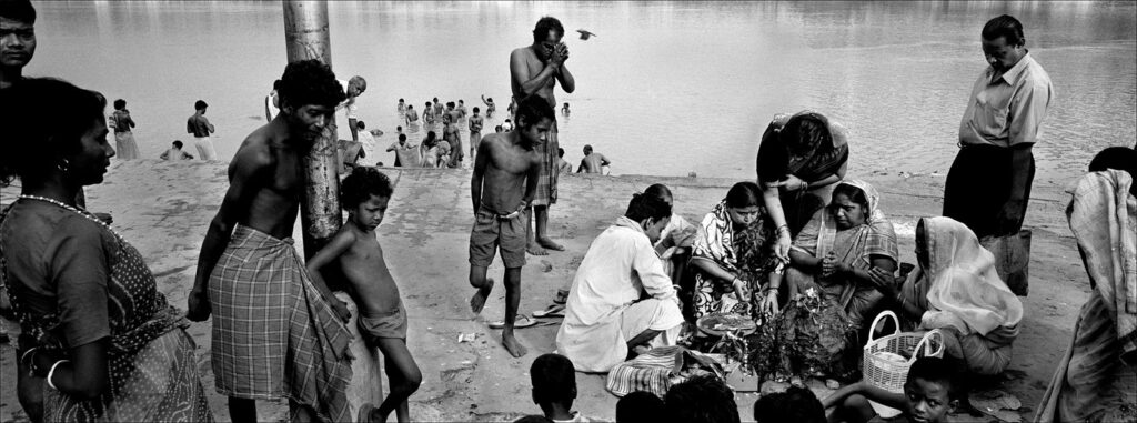 Women worshiping Ganga- Men watching, Varanasi 2004