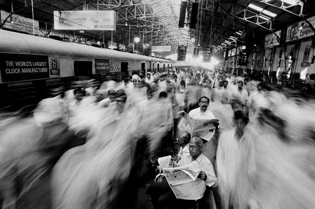 Local commuters at Church Gate railway station. Mumbai. 1995