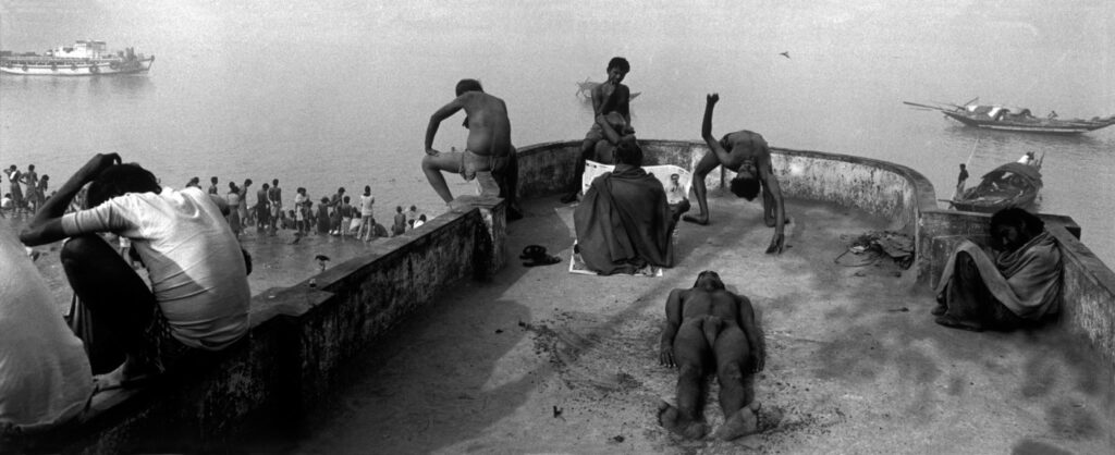 INDIA. Calcutta. Bodybuilders and wrestlers on the ghats.