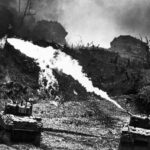 WORLD WAR II. The Pacific Campaign. April 1945. The Battle of Okinawa (Japanese island). US flame throwers used to dislodge the Japanese from their bunkers. Photo by W. Eugene Smith