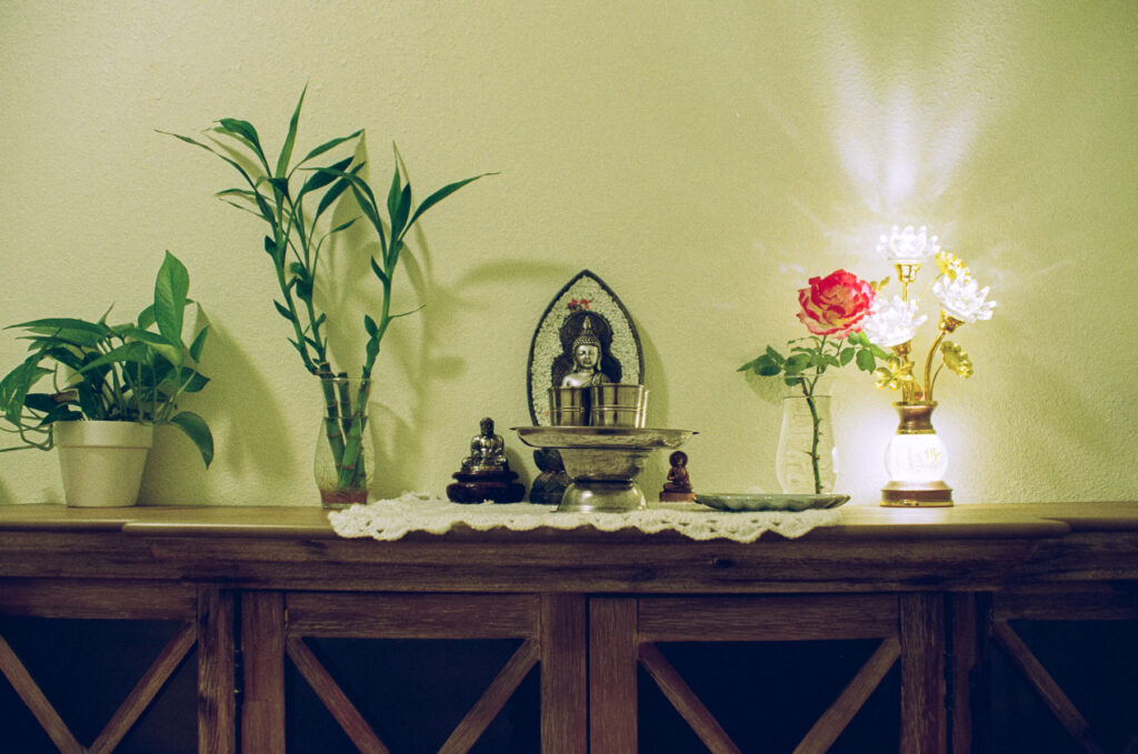 Offering Holy Water to Buddha.