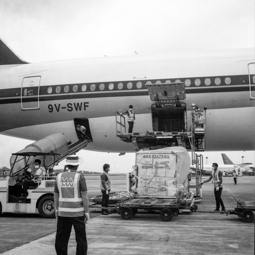 World Food Program(WFP)'s charter plane, carrying Covid-19 treatment supplies is being unloaded at the Yangon International Airport on 24 August 2020.