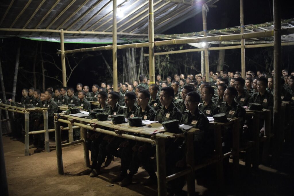 New recruits of Bamar People’s Liberation Army (BPLA) are seen during a political training session at a camp in a territory of The Karen National Union (KNU), Karen State, Myanmar, March 2, 2024. Founded in 2021 by urban activists following the military coup, the BPLA is one of the prominent armed groups representing the Bamar ethnic majority, fighting in alliance with ethnic minority groups to overthrow the military junta.